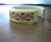 yellowturqiouseredblackbracelet1.jpg